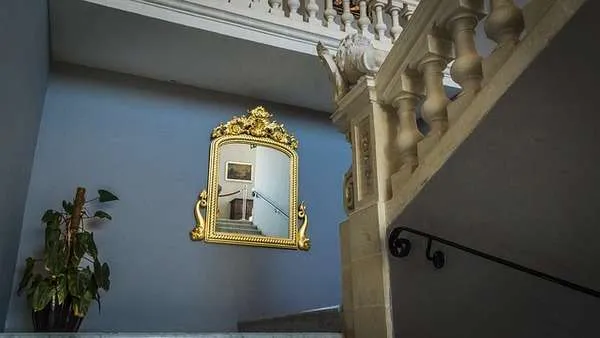 feng shui mirror facing stairs