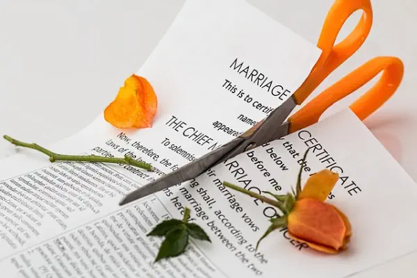feng shui Separation house. scissor cutting orange rose and marriage certificate 
