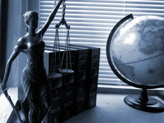 feng shui legal problem house. lady justice with scale and globe