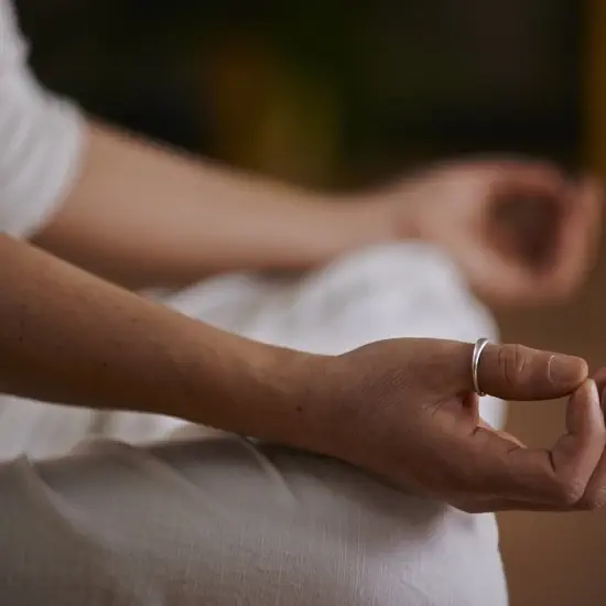 feng shui meditation room. female in meditation pose